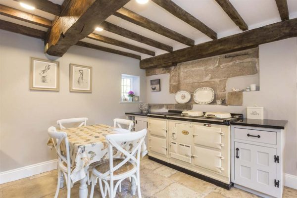 cottage kitchen resprayed white with large oven