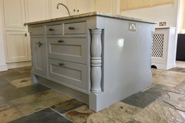 kitchen island resprayed in grey