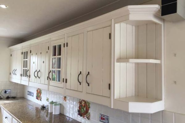 Traditional white sprayed kitchen cupboards